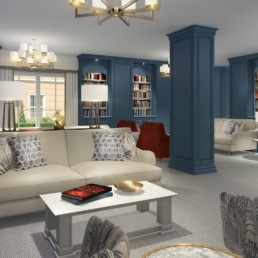 Lounge with cream sofas, red chairs and blue book shelves