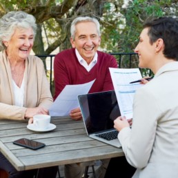 elderly couple seeking advice from expert